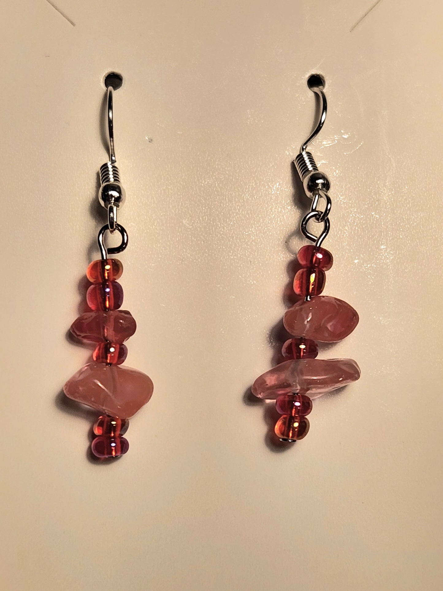Pink rocks with red-orange beads