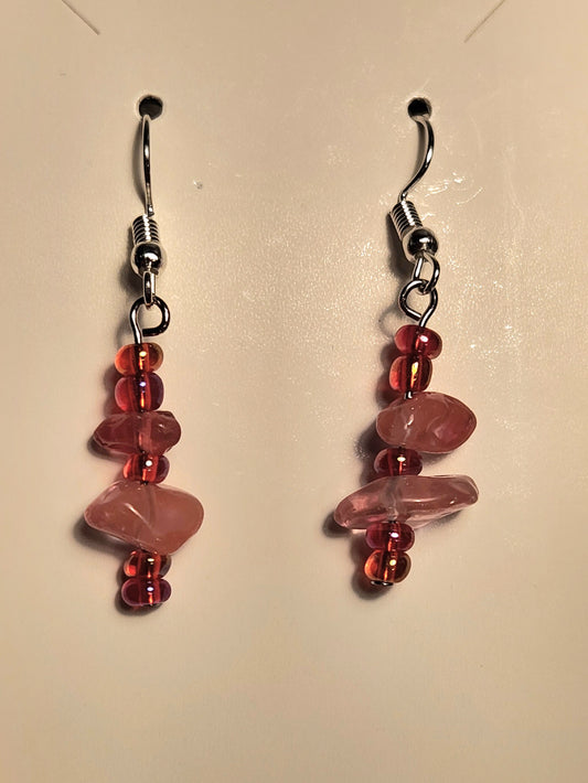 Pink rocks with red-orange beads