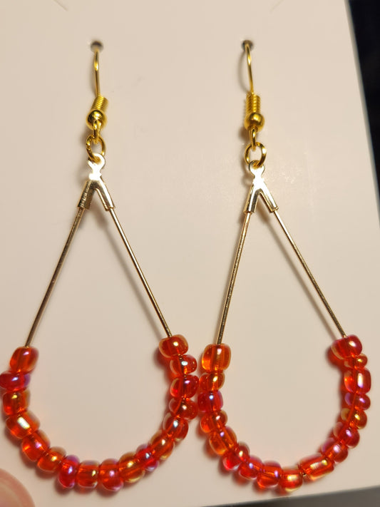 Gold Colored Teardrop Earrings with Orange Red Beads